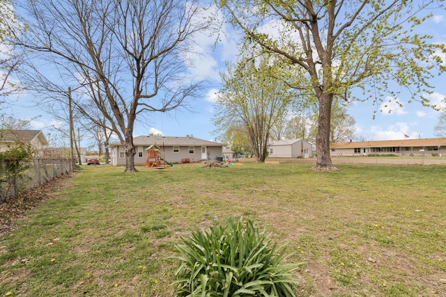 view of yard featuring fence