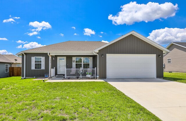 760 W Stewart St, Bolivar, MO 65613 - ranch-style house with covered porch, an attached garage, driveway, and board and batten siding