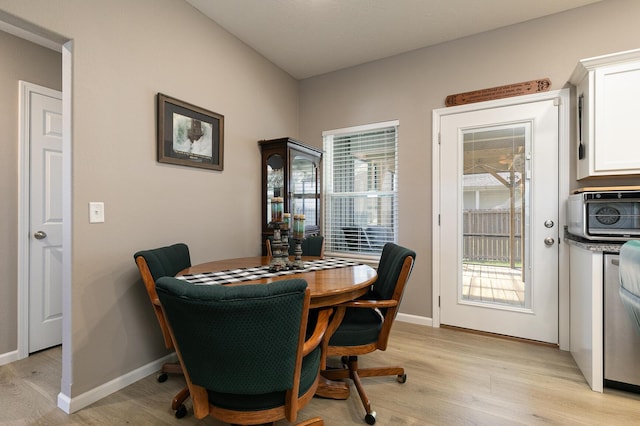 760 W Stewart St, Bolivar, MO 65613 - dining area featuring light wood-style flooring and baseboards