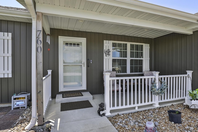 760 W Stewart St, Bolivar, MO 65613 - property entrance featuring a porch and board and batten siding