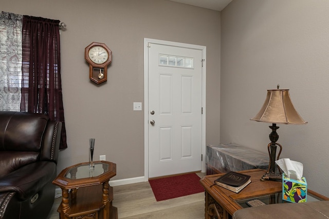 760 W Stewart St, Bolivar, MO 65613 - foyer with light wood-style floors, baseboards, and healthy amount of natural light