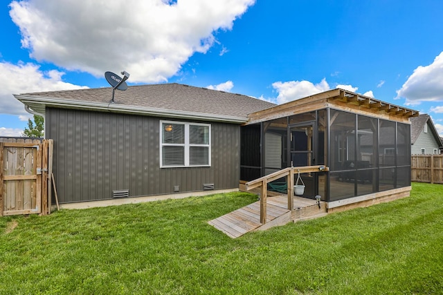 760 W Stewart St, Bolivar, MO 65613 - back of house with a sunroom and roof with shingles