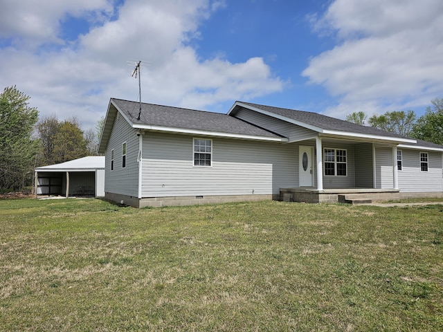 exterior space with roof with shingles, a carport, a porch, crawl space, and a front yard