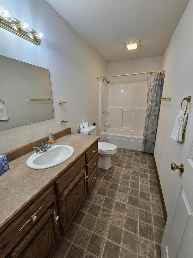 bathroom with toilet, vanity, tile patterned floors, and shower / bath combo with shower curtain