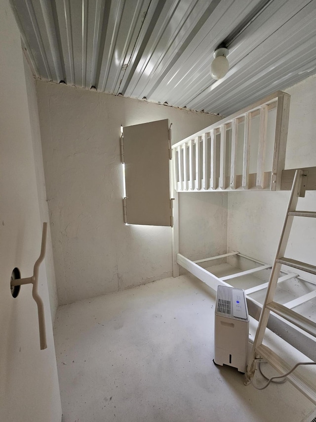 basement featuring heating unit