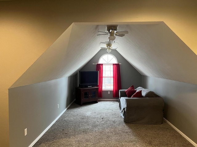 bonus room featuring carpet flooring, baseboards, vaulted ceiling, and ceiling fan