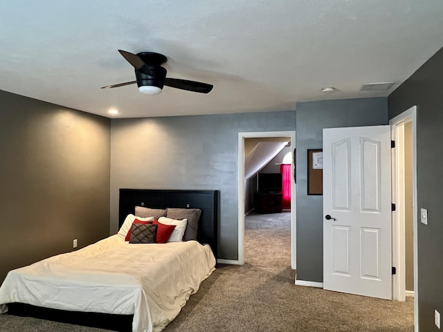 bedroom with visible vents, ceiling fan, baseboards, and carpet floors