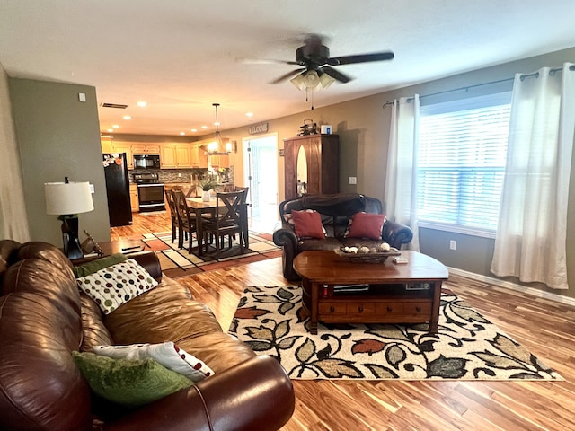 435 E Hadley St, Republic, MO 65738 - living area with light wood-style floors, a ceiling fan, baseboards, and recessed lighting