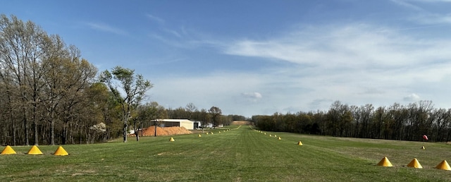 surrounding community with a lawn
