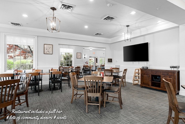 160 The Blfs Unit 3, Branson, MO 65616 - carpeted dining area with visible vents and ornamental molding