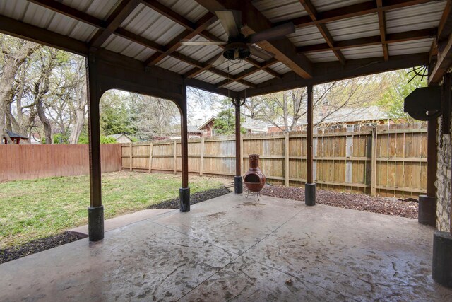 view of patio / terrace with a fenced backyard and ceiling fan