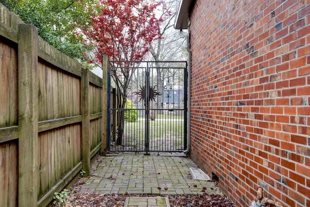 view of gate featuring fence