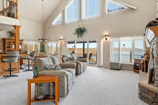 500 Navajo Trl, Kimberling City, MO 65686 - carpeted living room featuring high vaulted ceiling