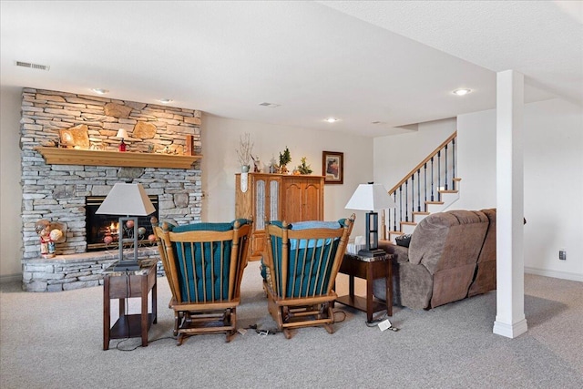 500 Navajo Trl, Kimberling City, MO 65686 - carpeted living area featuring a fireplace, visible vents, recessed lighting, stairway, and baseboards