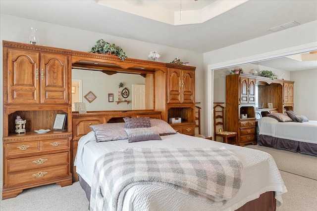 500 Navajo Trl, Kimberling City, MO 65686 - bedroom with visible vents, a closet, and light carpet