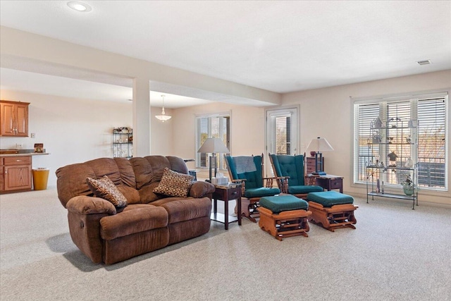 500 Navajo Trl, Kimberling City, MO 65686 - carpeted living area with visible vents, plenty of natural light, and recessed lighting
