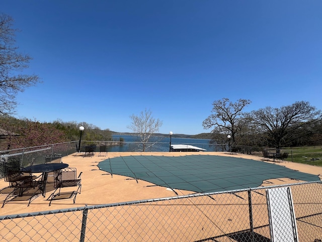 500 Navajo Trl, Kimberling City, MO 65686 - view of pool with a patio area, a fenced in pool, and fence
