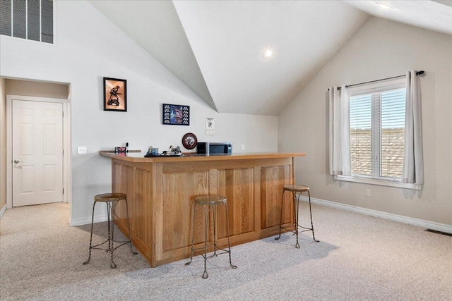 500 Navajo Trl, Kimberling City, MO 65686 - bar featuring light carpet, a dry bar, vaulted ceiling, and visible vents