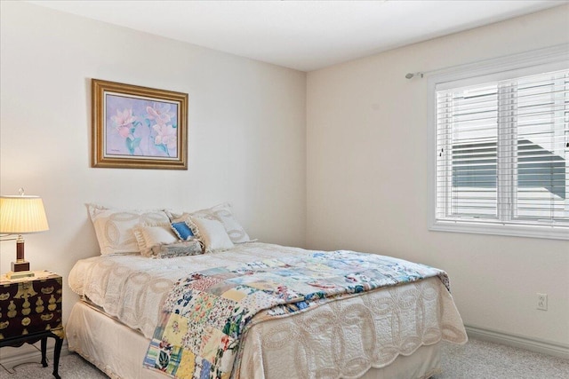 500 Navajo Trl, Kimberling City, MO 65686 - carpeted bedroom with baseboards and multiple windows