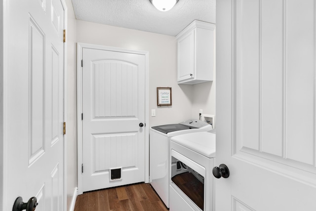 704 E Waterford Blvd, Ozark, MO 65721 - laundry room with separate washer and dryer, a textured ceiling, cabinet space, and dark wood-style floors
