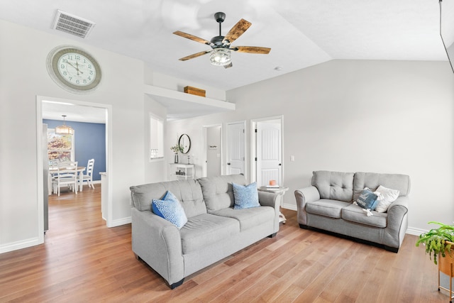 704 E Waterford Blvd, Ozark, MO 65721 - living room featuring light wood-type flooring, a ceiling fan, visible vents, lofted ceiling, and baseboards