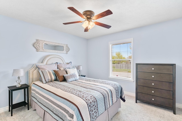 704 E Waterford Blvd, Ozark, MO 65721 - bedroom with baseboards, ceiling fan, and light colored carpet