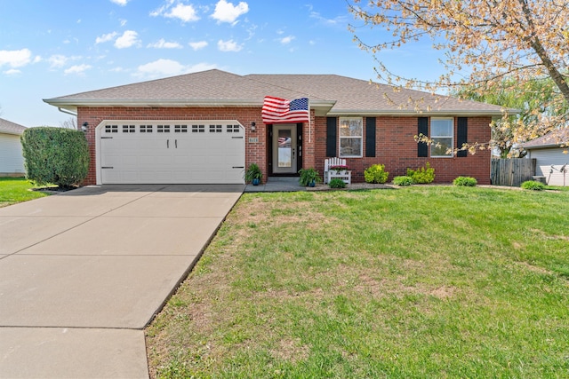 704 E Waterford Blvd, Ozark, MO 65721 - ranch-style home featuring concrete driveway, brick siding, and a front lawn