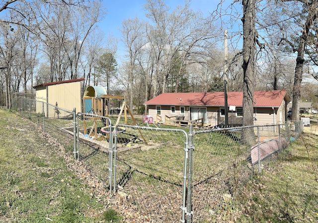 85 Peggy Ave, Mammoth Spring, AR 72554 - view of yard with a playground and a gate