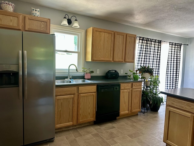 85 Peggy Ave, Mammoth Spring, AR 72554 - kitchen with stainless steel refrigerator with ice dispenser, black dishwasher, dark countertops, and a textured ceiling