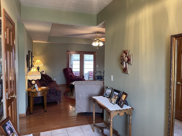 1605 S Meadow Ln, Bolivar, MO 65613 - living room featuring a ceiling fan and light tile patterned flooring