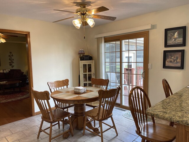 1605 S Meadow Ln, Bolivar, MO 65613 - dining room featuring light tile patterned floors, a ceiling fan, and visible vents