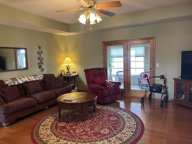 1605 S Meadow Ln, Bolivar, MO 65613 - living area with a ceiling fan and wood finished floors