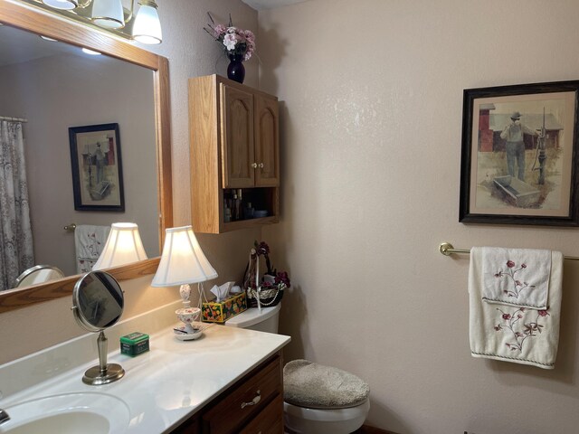 1605 S Meadow Ln, Bolivar, MO 65613 - bathroom with vanity and toilet