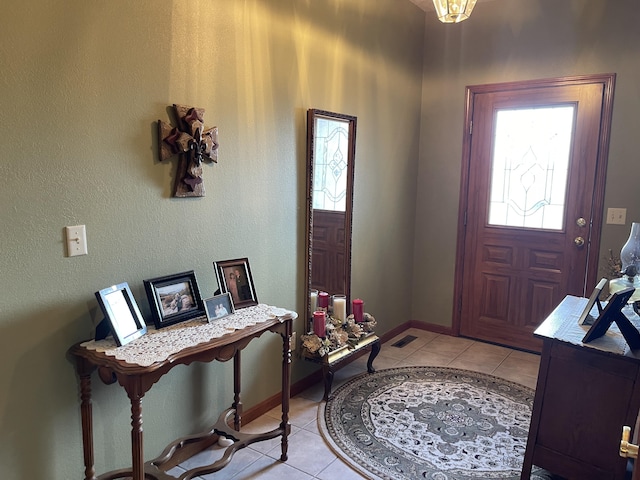 1605 S Meadow Ln, Bolivar, MO 65613 - entryway featuring visible vents, baseboards, and light tile patterned flooring