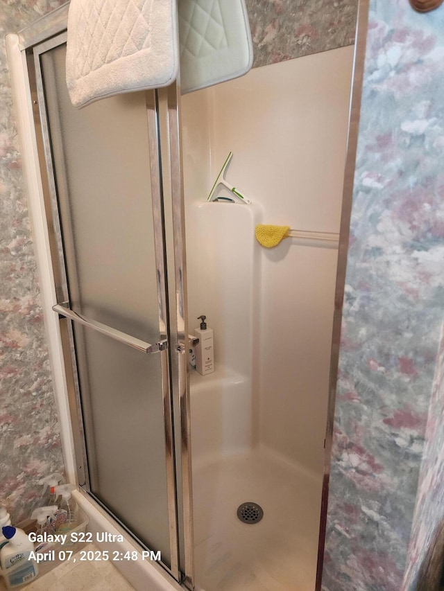 bathroom with a stall shower