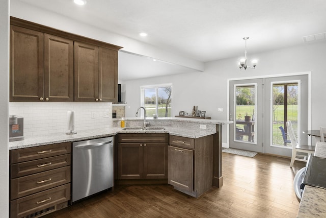 1758 W Big Meadows Ln, Nixa, MO 65714 - kitchen with a sink, stainless steel dishwasher, a peninsula, and dark wood finished floors