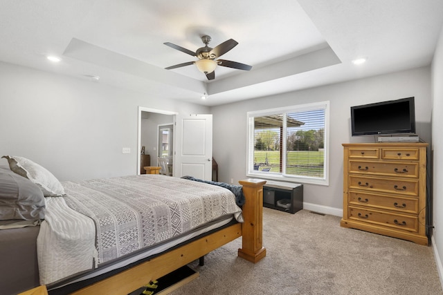 1758 W Big Meadows Ln, Nixa, MO 65714 - bedroom with ceiling fan, light colored carpet, recessed lighting, a raised ceiling, and baseboards