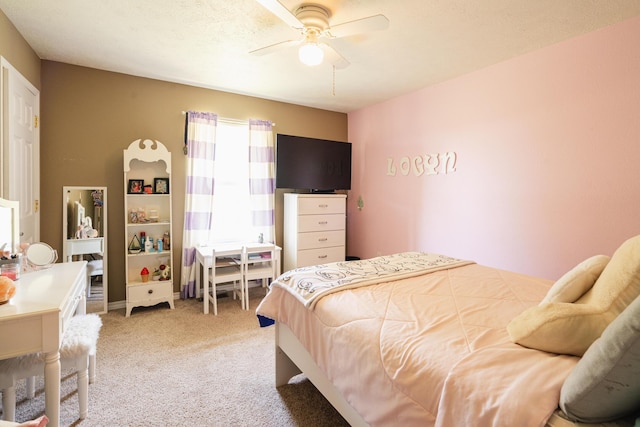 carpeted bedroom with a ceiling fan
