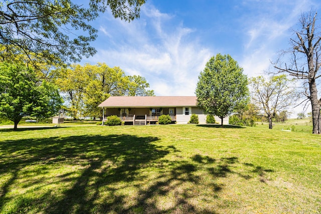 view of front of home with a front lawn