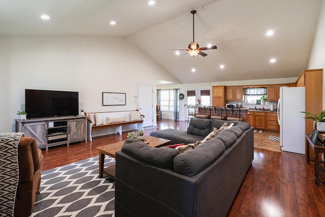 living room featuring high vaulted ceiling, dark wood-style floors, recessed lighting, and a ceiling fan
