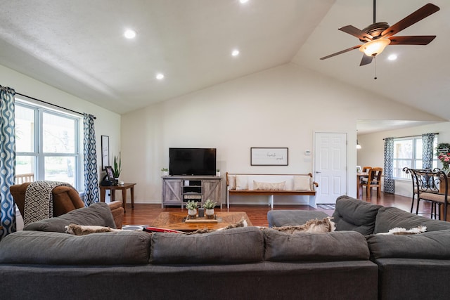 living room featuring ceiling fan, high vaulted ceiling, recessed lighting, wood finished floors, and baseboards