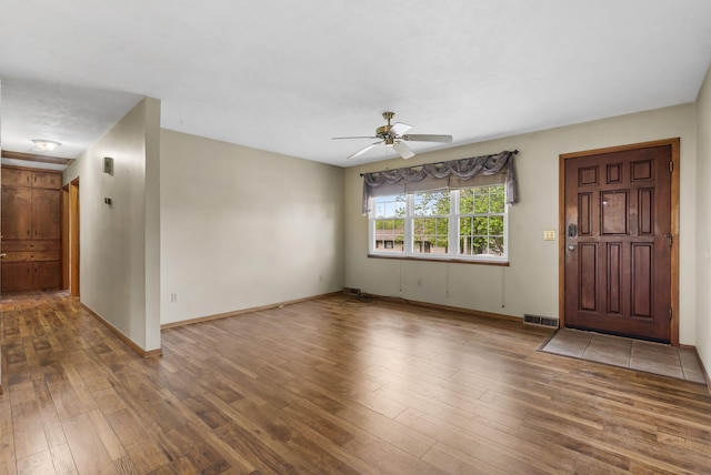3144 N Pierce Ave, Springfield, MO 65803 - interior space featuring wood finished floors, ceiling fan, baseboards, and visible vents