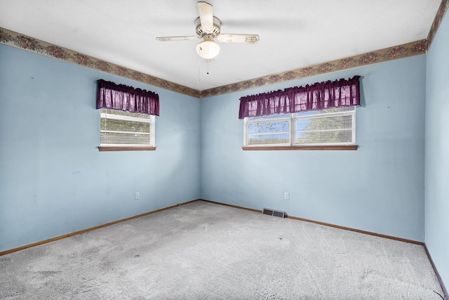 3144 N Pierce Ave, Springfield, MO 65803 - spare room with carpet, baseboards, and a ceiling fan