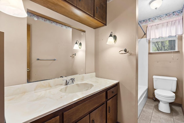 3144 N Pierce Ave, Springfield, MO 65803 - bathroom featuring tile patterned floors, toilet, vanity, and bathing tub / shower combination