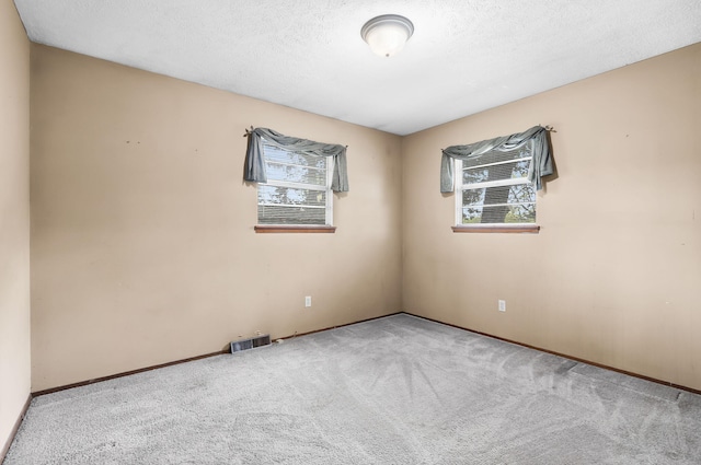 3144 N Pierce Ave, Springfield, MO 65803 - empty room with baseboards and carpet floors