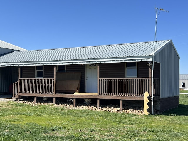 0 S 162nd Rd, Bolivar, MO 65613 - back of property featuring a porch, a lawn, and metal roof