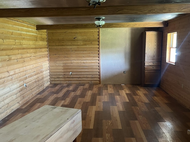 0 S 162nd Rd, Bolivar, MO 65613 - empty room featuring dark wood-style flooring, wood walls, and beam ceiling