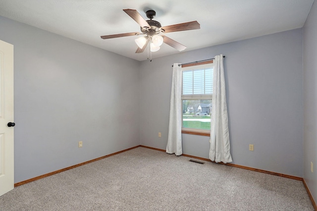 3684 Bridgewood Ave N, Springfield, MO 65803 - carpeted spare room with baseboards, a ceiling fan, and visible vents