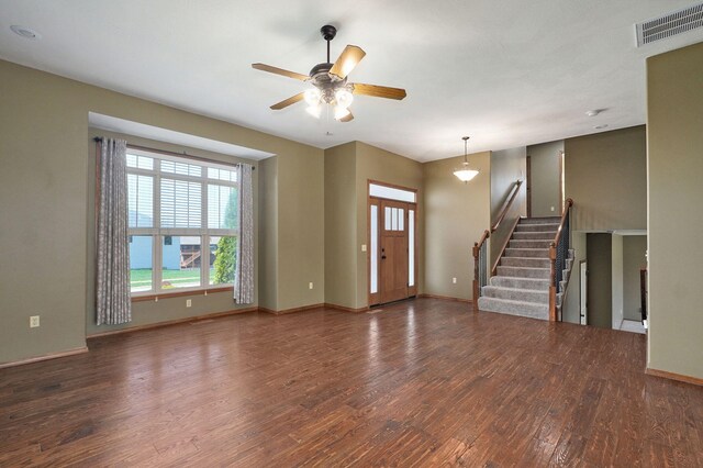 3684 Bridgewood Ave N, Springfield, MO 65803 - foyer featuring baseboards, visible vents, a ceiling fan, wood finished floors, and stairs