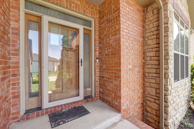 3684 Bridgewood Ave N, Springfield, MO 65803 - property entrance featuring a porch and brick siding